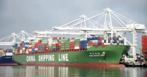 A container ship loading at a port